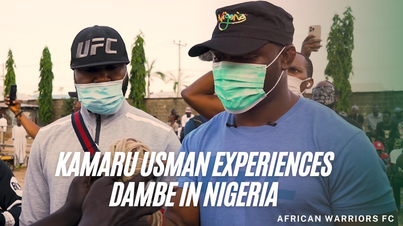 Campeão do UFC, Usman conhece o tradicional Boxe com uma mão na Nigéria e se anima com luta; assista
